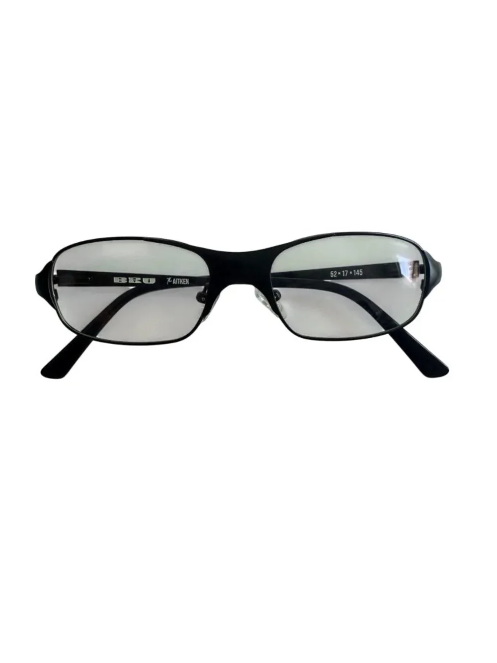Bru Aitken Blue Light Glasses in Window